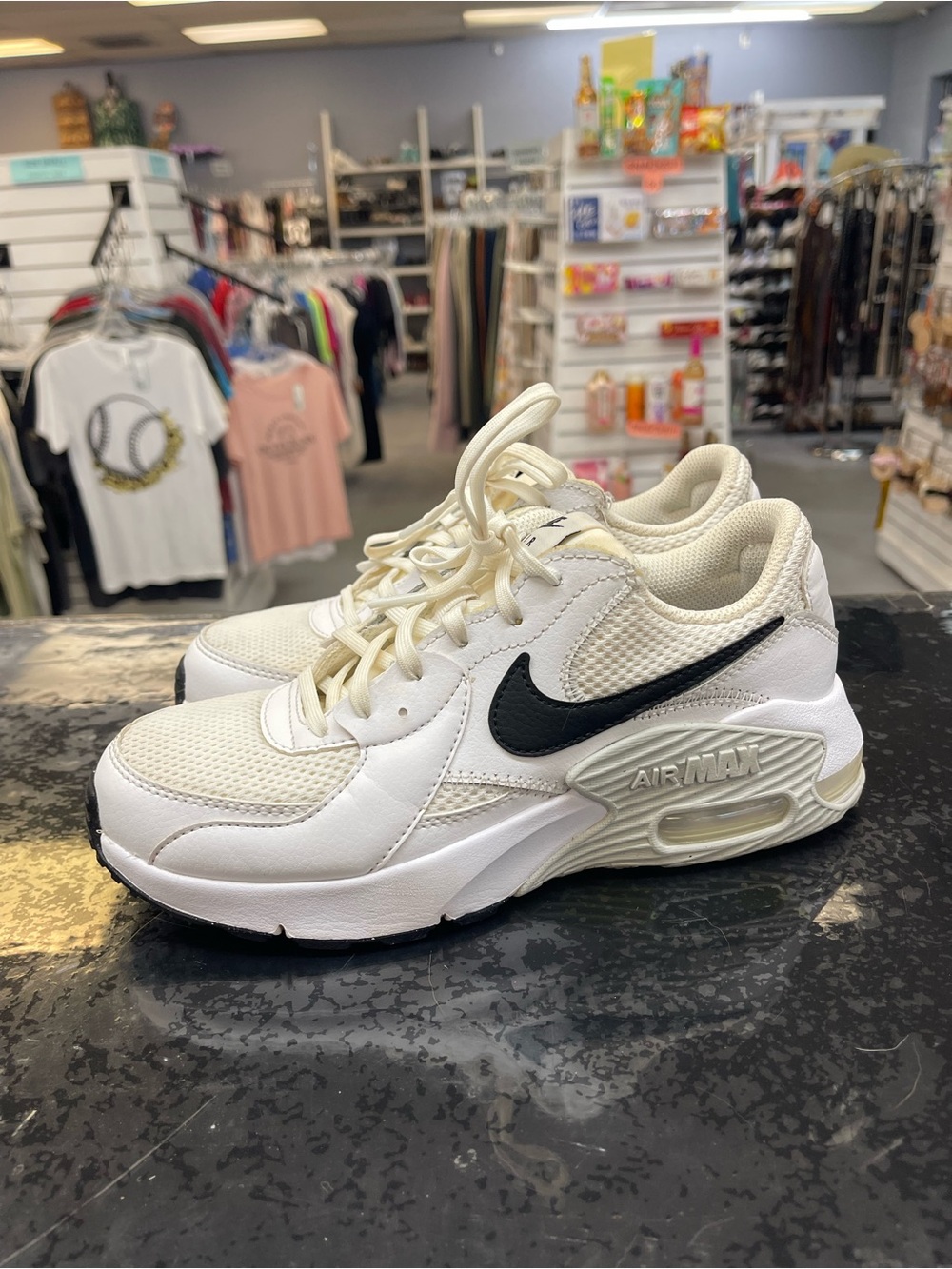 Nike Women's White Sneakers with Black Swoosh
